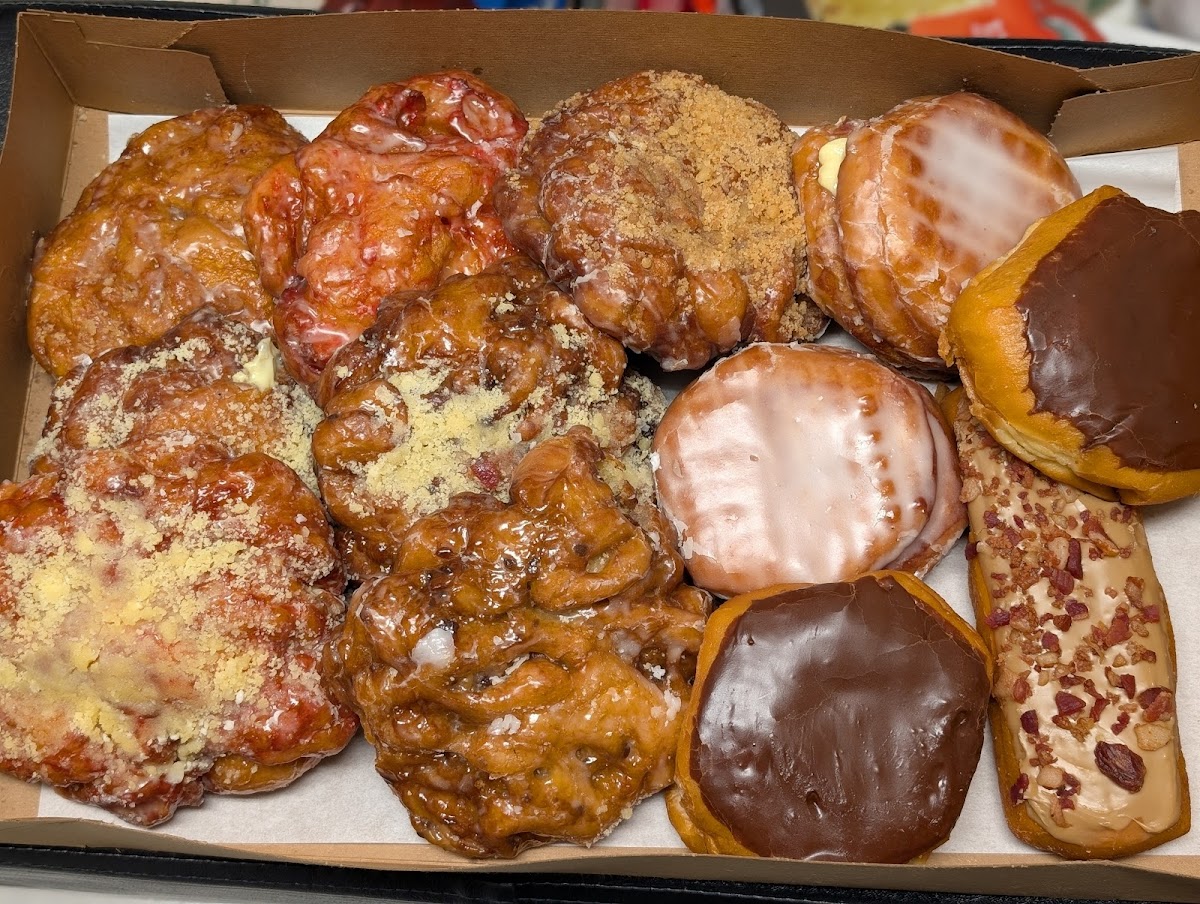 A spread of Donut Nook fritters and specialty donuts